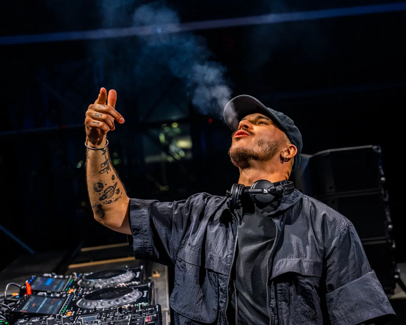 Nico Moreno behind the decks radiating high energy